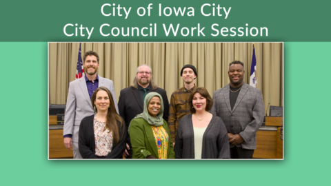 City Council members posing for a portrait in Emma Harvat Hall.